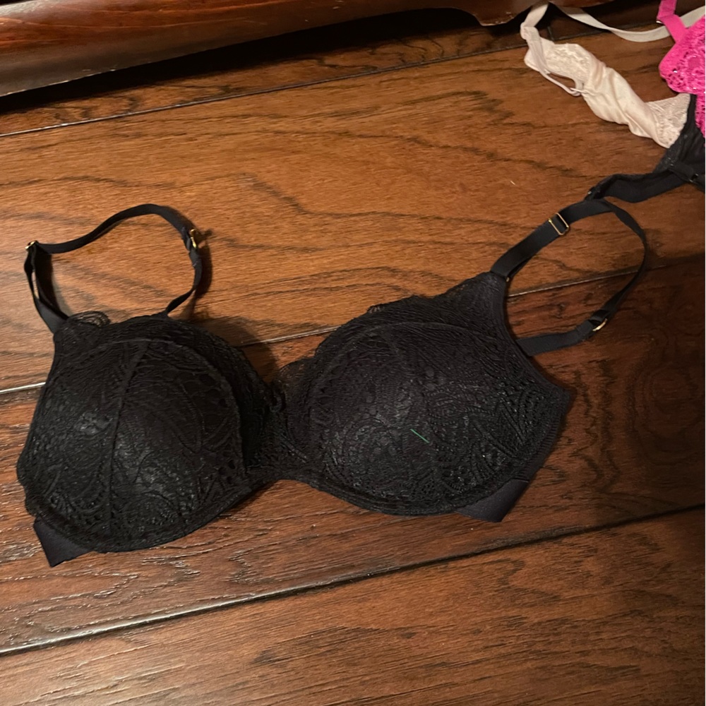 1 tan and one black lively bra